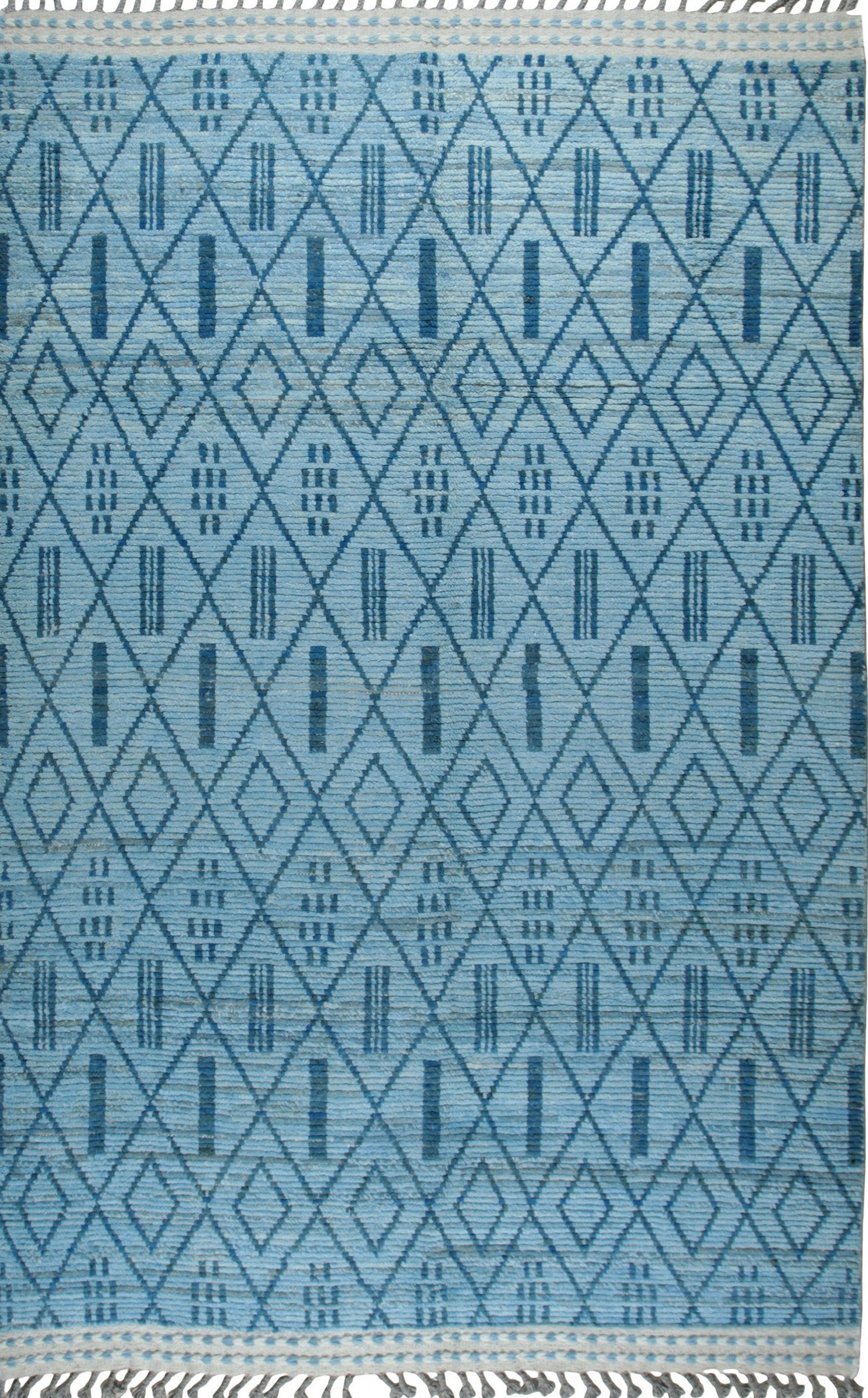 Isolated view of Stylish Marrakech Blue Hand-Knotted Wool Rug, showcasing its intricate geometric design and rich blue hues.