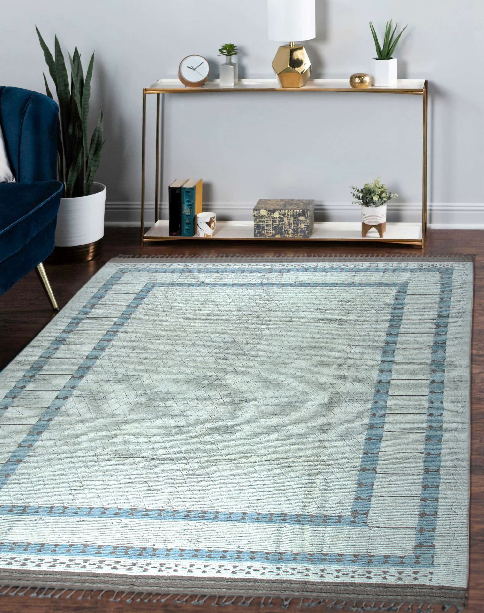 Timeless Marrakech Beige Hand-Knotted Wool Rug, featuring a geometric Moroccan design in beige and ivory hues, displayed within a living room setting.