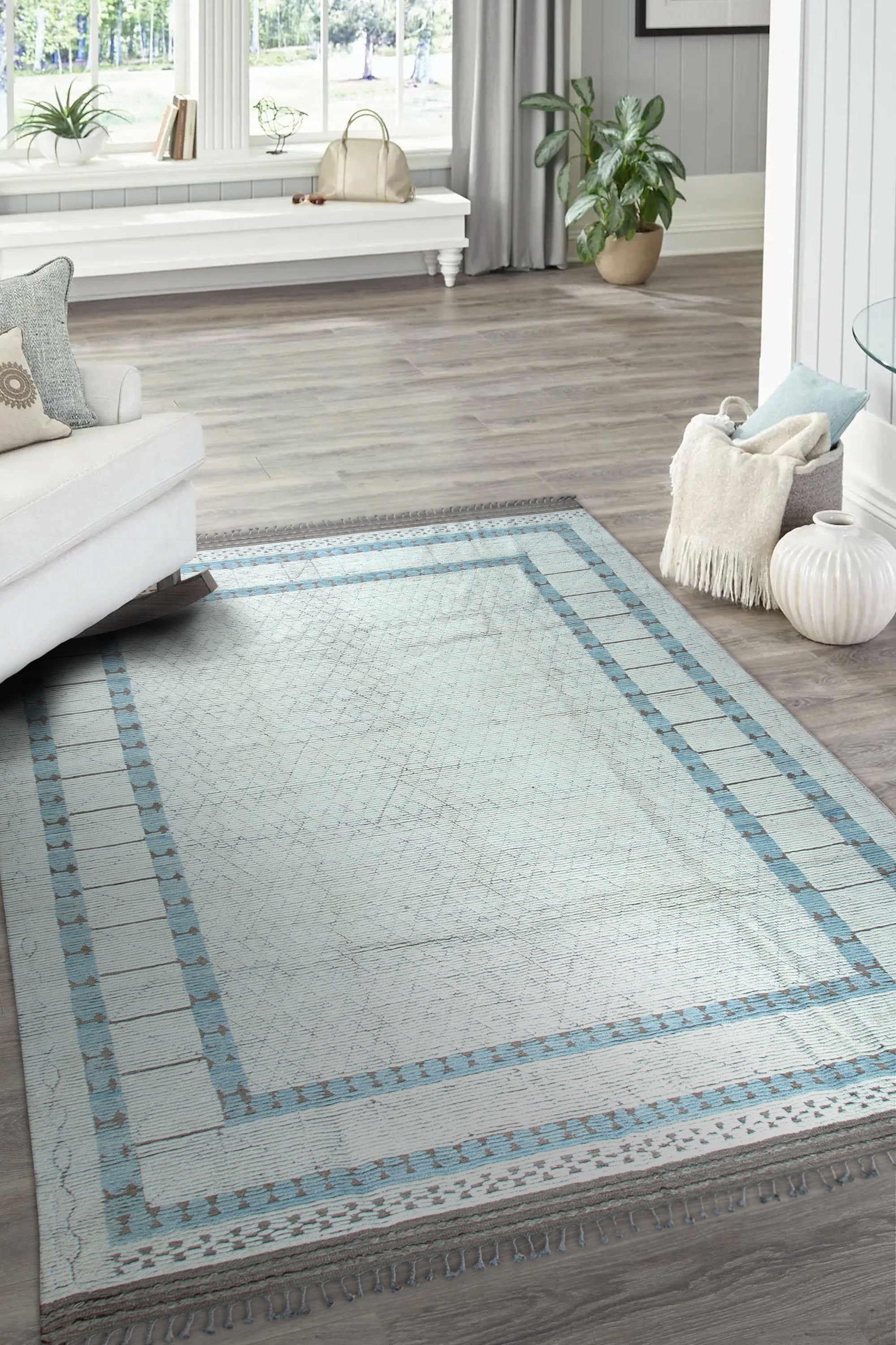 Timeless Marrakech Beige Hand-Knotted Wool Rug, a textural field of subtle beige variations and geometric motifs, anchors a comfortably styled living room.