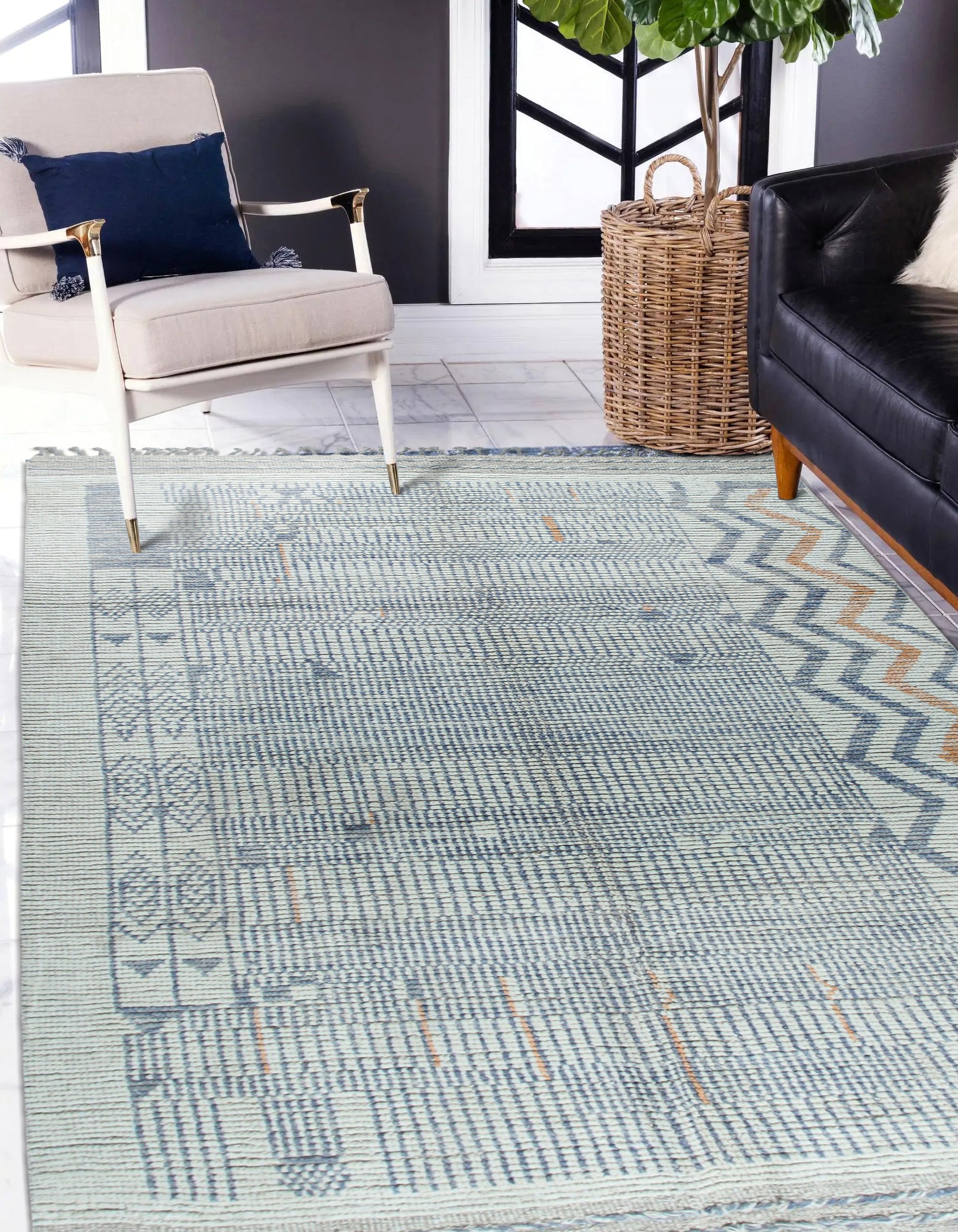 Subtle Marrakech Ivory Hand-Knotted Wool Rug, showcasing a relaxed living room setting, the ivory wool rug grounds the space with its subtle, hand-knotted texture and understated Moroccan-inspired design.