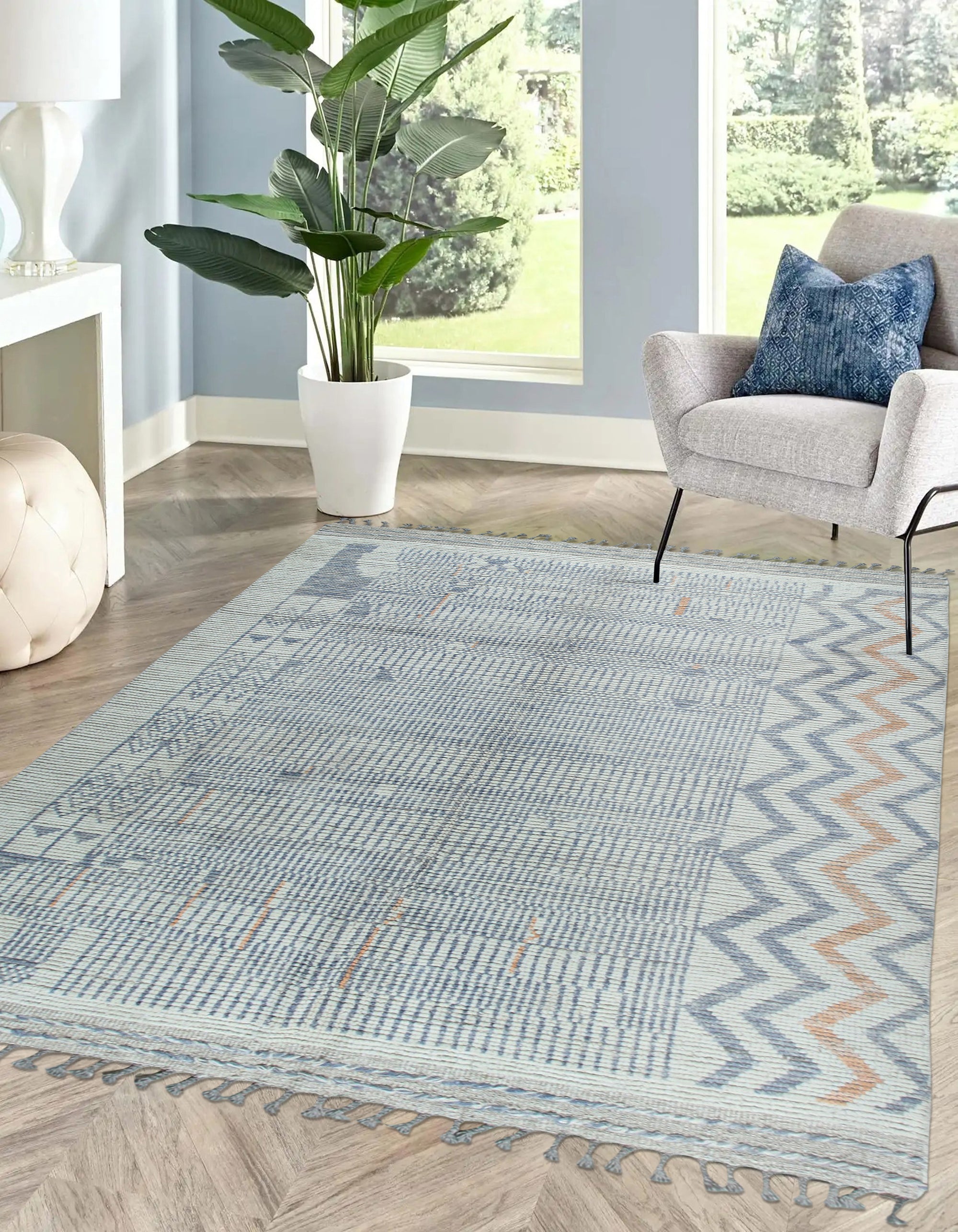 Subtle Marrakech Ivory Hand-Knotted Wool Rug, with subtle geometric patterns in soft ivory tones, showcased in a modern living room setting with natural light.