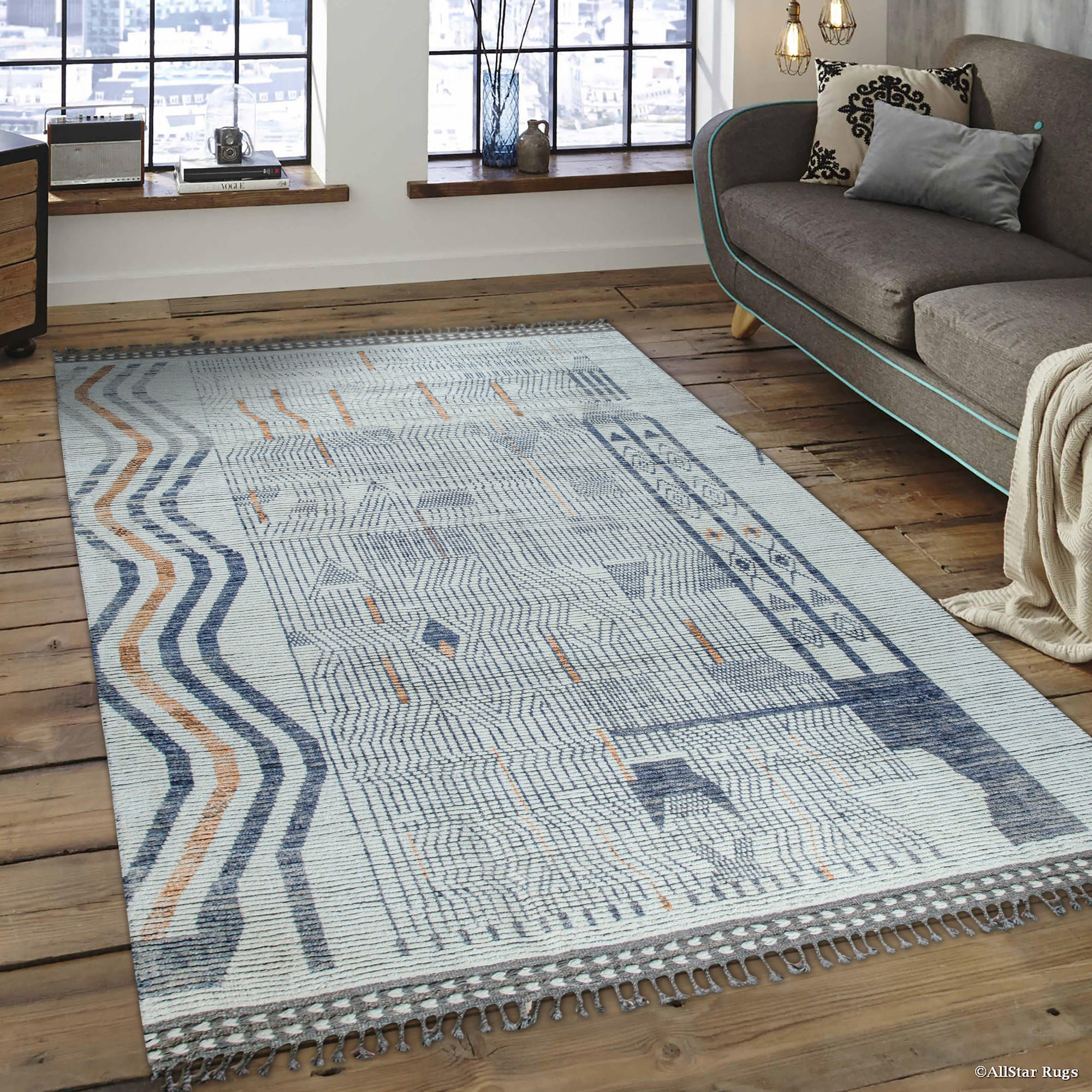 Abstract Marrakech Ivory Hand-Knotted Wool Rug, showcasing intricate geometric patterns in soft ivory tones, elegantly displayed in a modern living space.