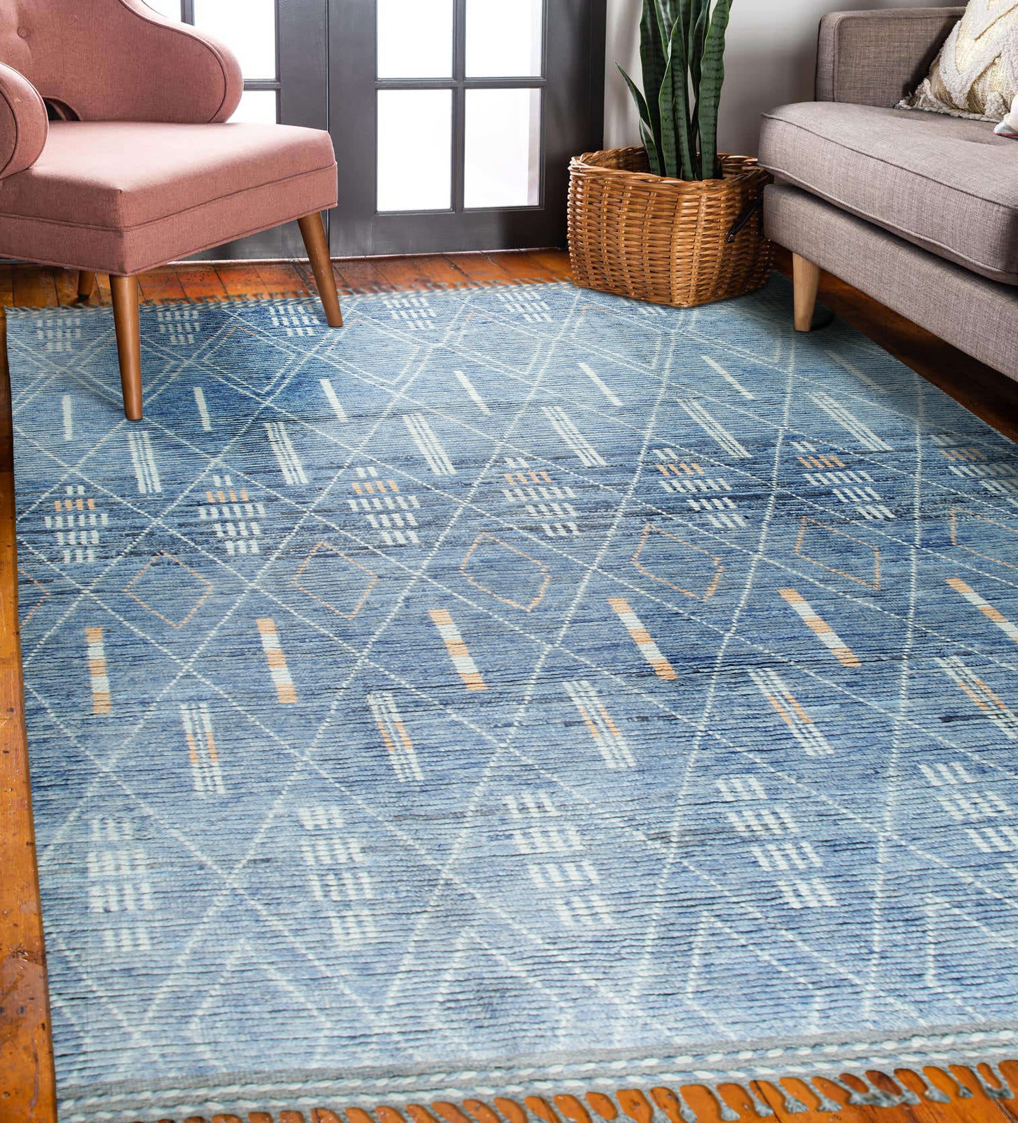 Graceful Marrakech Blue Hand-Knotted Wool Rug, a luxurious blue wool rug with a geometric Moroccan-inspired design, enriching a living space.