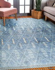 Graceful Marrakech Blue Hand-Knotted Wool Rug, a luxurious blue wool rug with a geometric Moroccan-inspired design, enriching a living space.