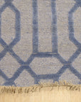 Classic Lush Blue Hand Knotted Wool & Viscose Rug, its deep blue tones and luxurious texture showcased, filling a brightly lit space with modern elegance.