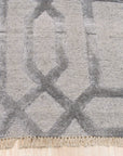 Trara Talia Gray Hand Knotted Wool & Viscose Rug, presenting a textured, subtle pattern in shades of gray, filling the frame with its soft pile and artisanal construction.