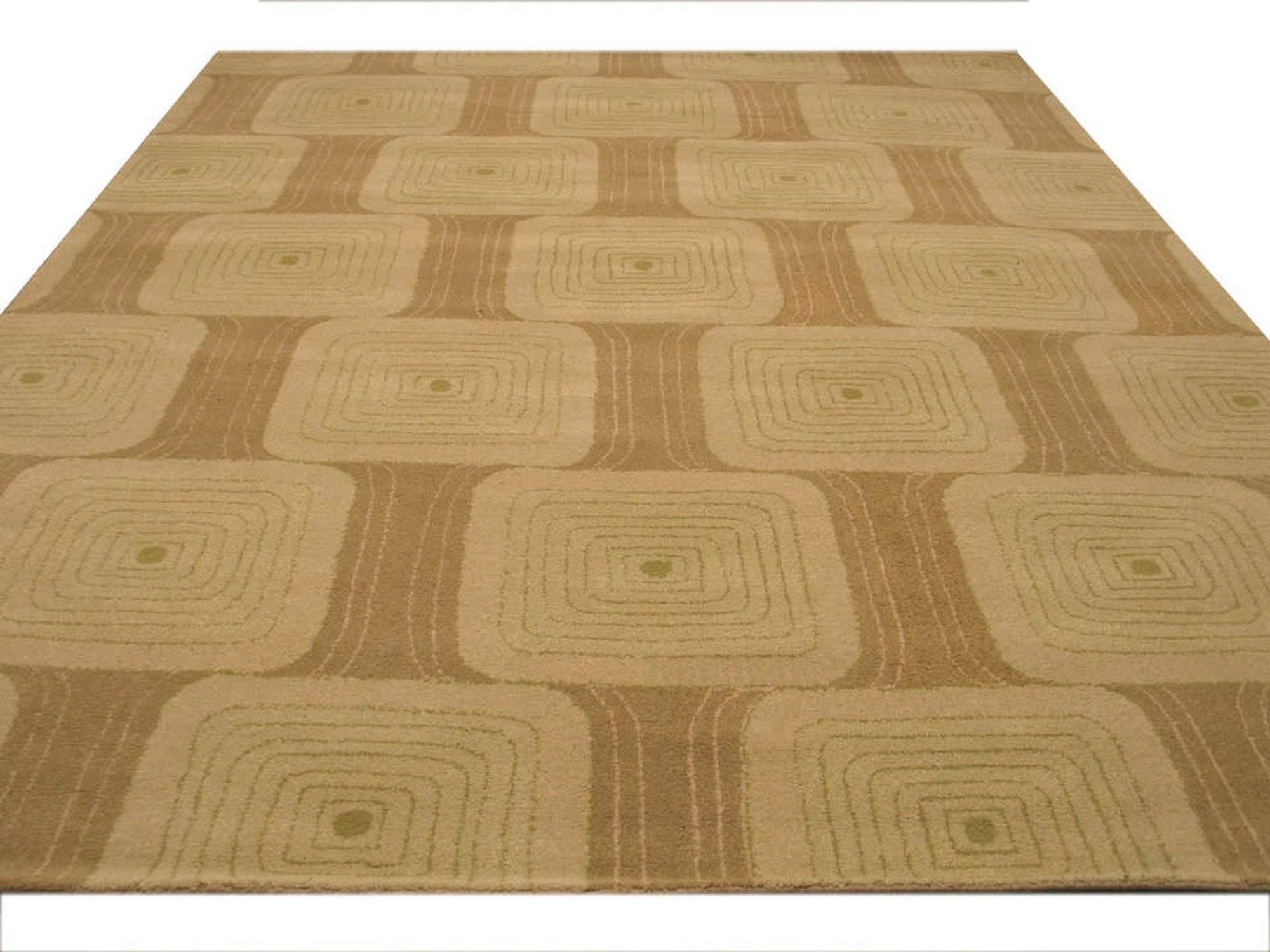 Brenda Kira Green Hand Tufted Wool Rug, showcasing its vibrant green hues and textured wool pile in a bright living room setting.