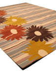 Artistic Maya Multicolor Hand Tufted Wool Rug, vibrant hues dance across a plush wool surface, hand-tufted textures adding depth and warmth to a modern living space.