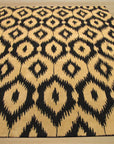 Classic Stylish Black Hand Tufted Wool Rug, plush and textural, anchoring a modern living room with its bold black wool pile.