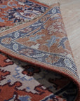 Lush Rustic Rust Hand Knotted Wool Rug, displaying warm rust tones and hand-knotted texture, seen in a styled interior setting.