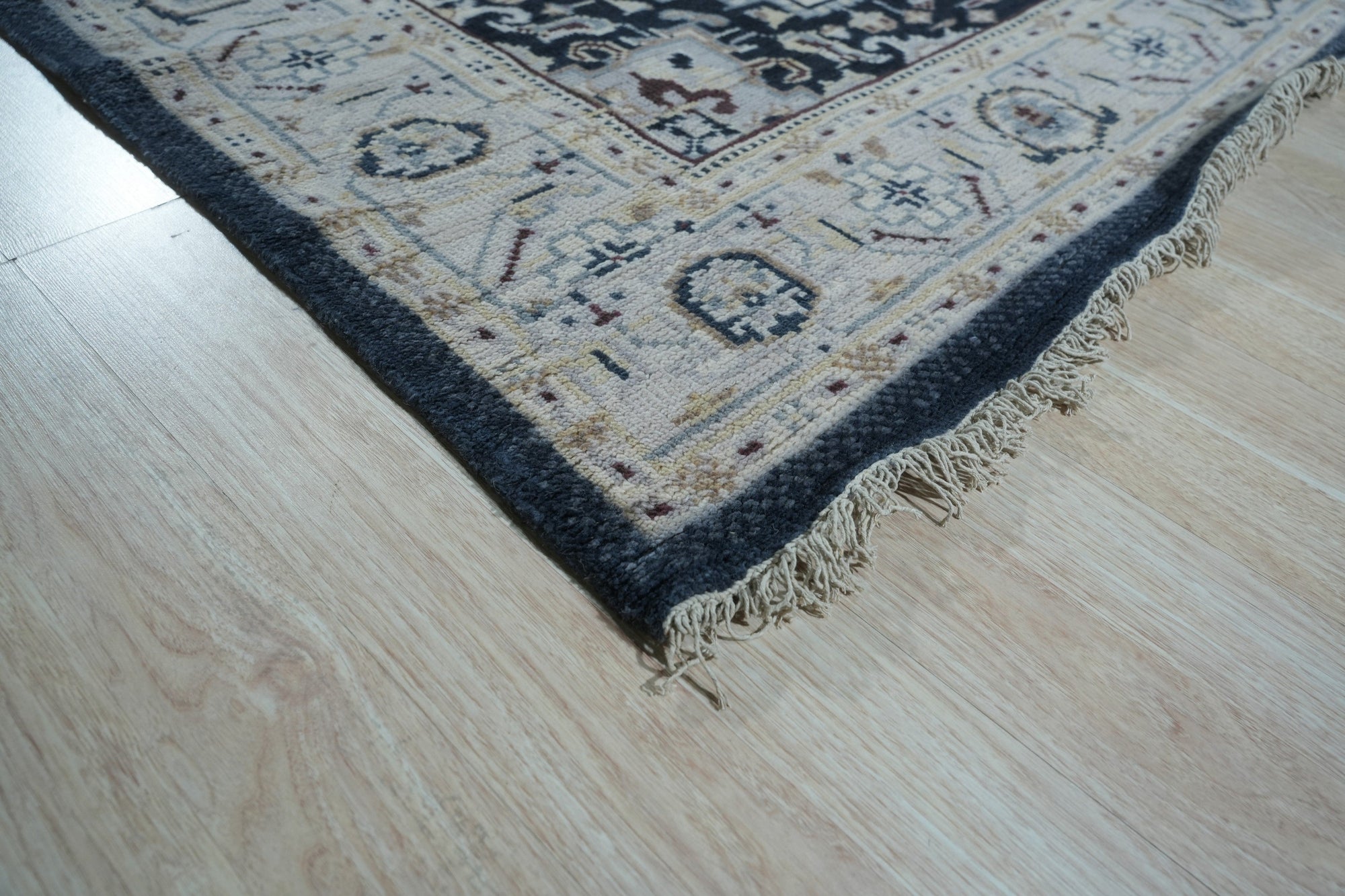Luxurious Traditional Beige Hand Knotted Wool Rug, a beige wool rug with a traditional design, laying flat to showcase its pattern and texture.