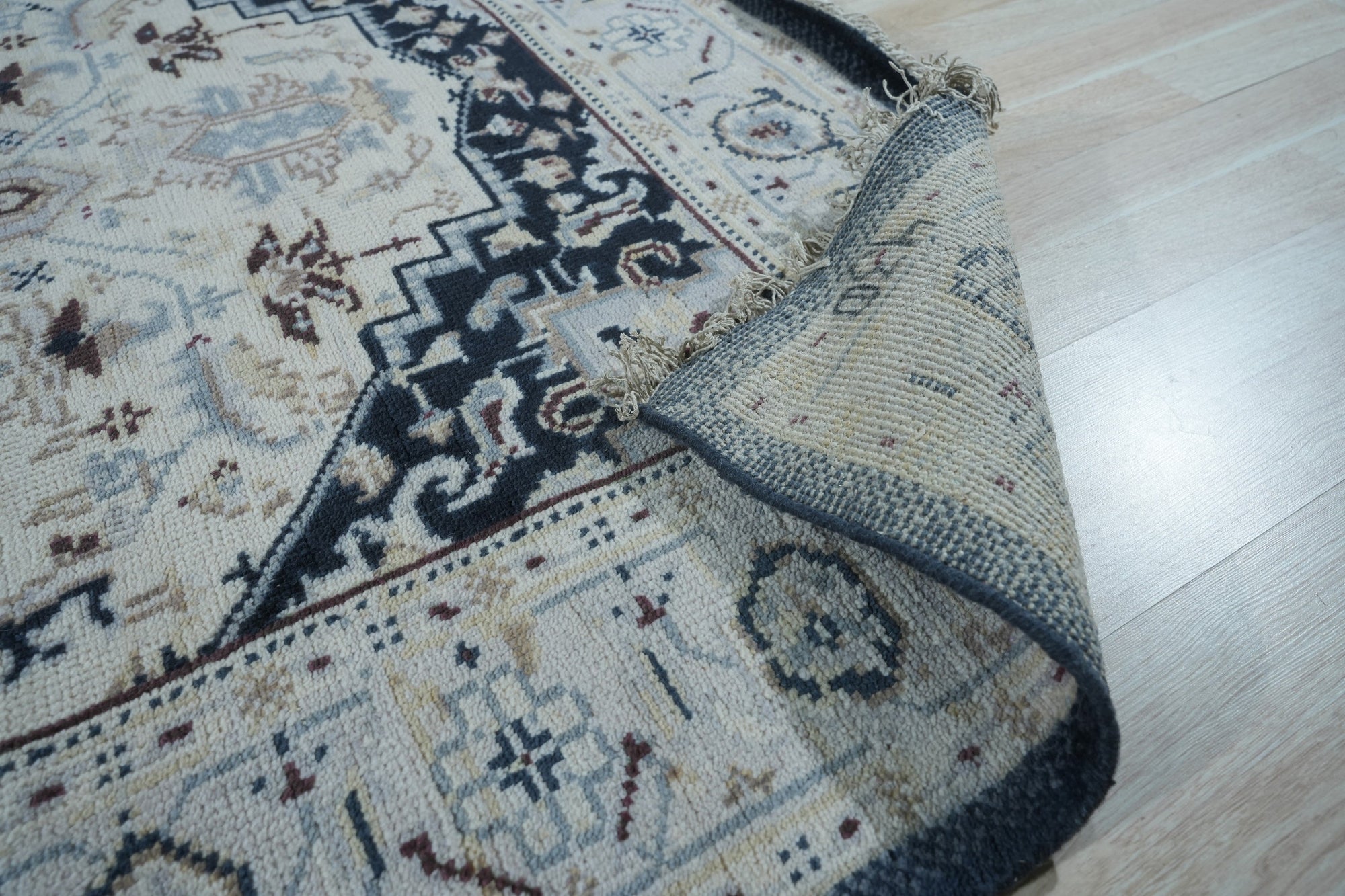 Luxurious Traditional Beige Hand Knotted Wool Rug, showcasing intricate floral and geometric patterns in warm beige tones, adding timeless elegance to a room.