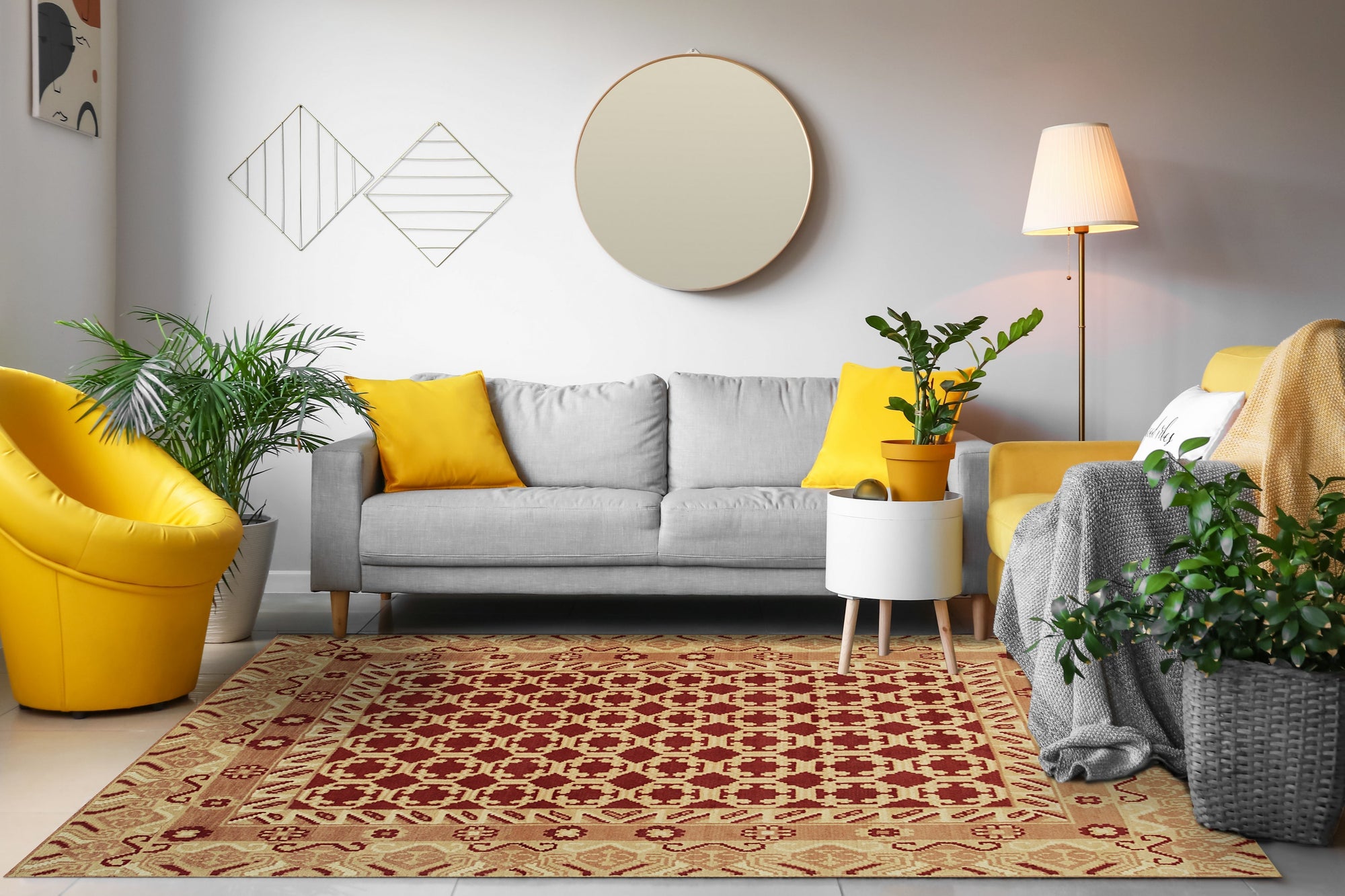 Chloe Trara Red Hand Knotted Wool Rug, a vibrant red wool rug with a traditional, intricate pattern, anchoring a contemporary living room space with a light sofa and natural light.