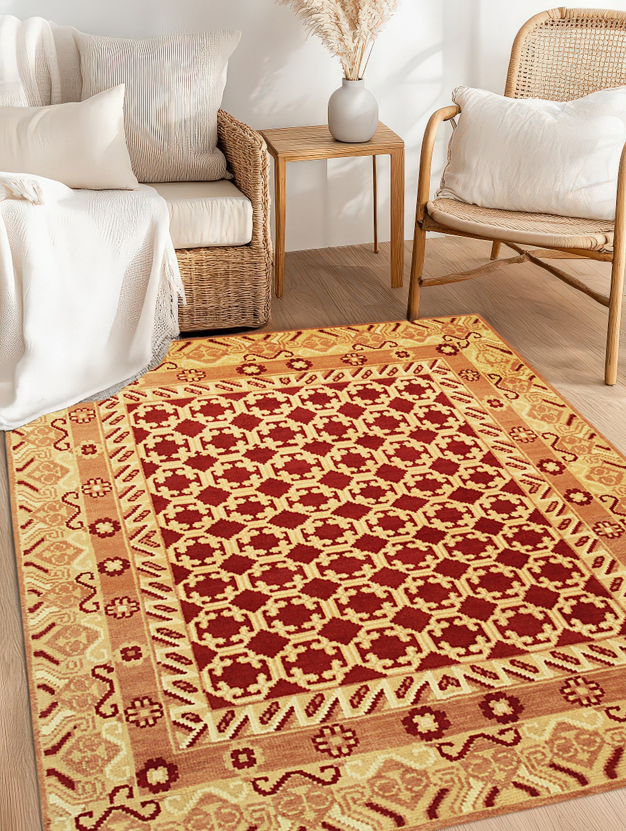 Chloe Trara Red Hand Knotted Wool Rug, showcasing rich reds and subtle patterns woven into a plush wool texture, lending warmth and intricate design to a stylish living space.
