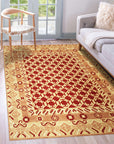 Chloe Trara Red Hand Knotted Wool Rug, a vibrant red and hand-knotted wool rug, showcasing intricate patterns and textures in a warm, inviting living space.