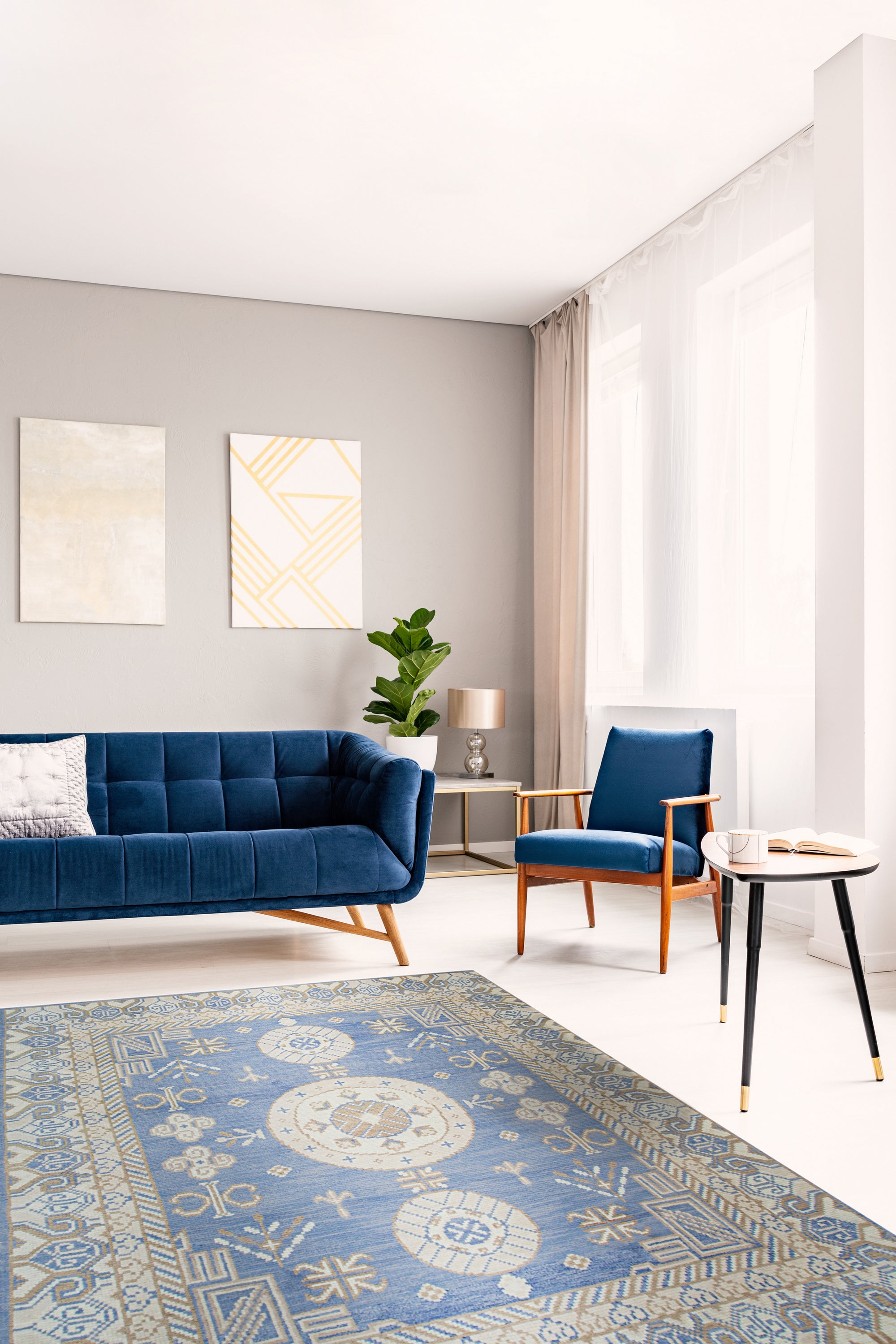Handcrafted Traditional Blue Hand Knotted Wool Rug, a rich blue wool rug featuring an intricate traditional pattern, displayed in a brightly lit room to showcase its detail and color variations.