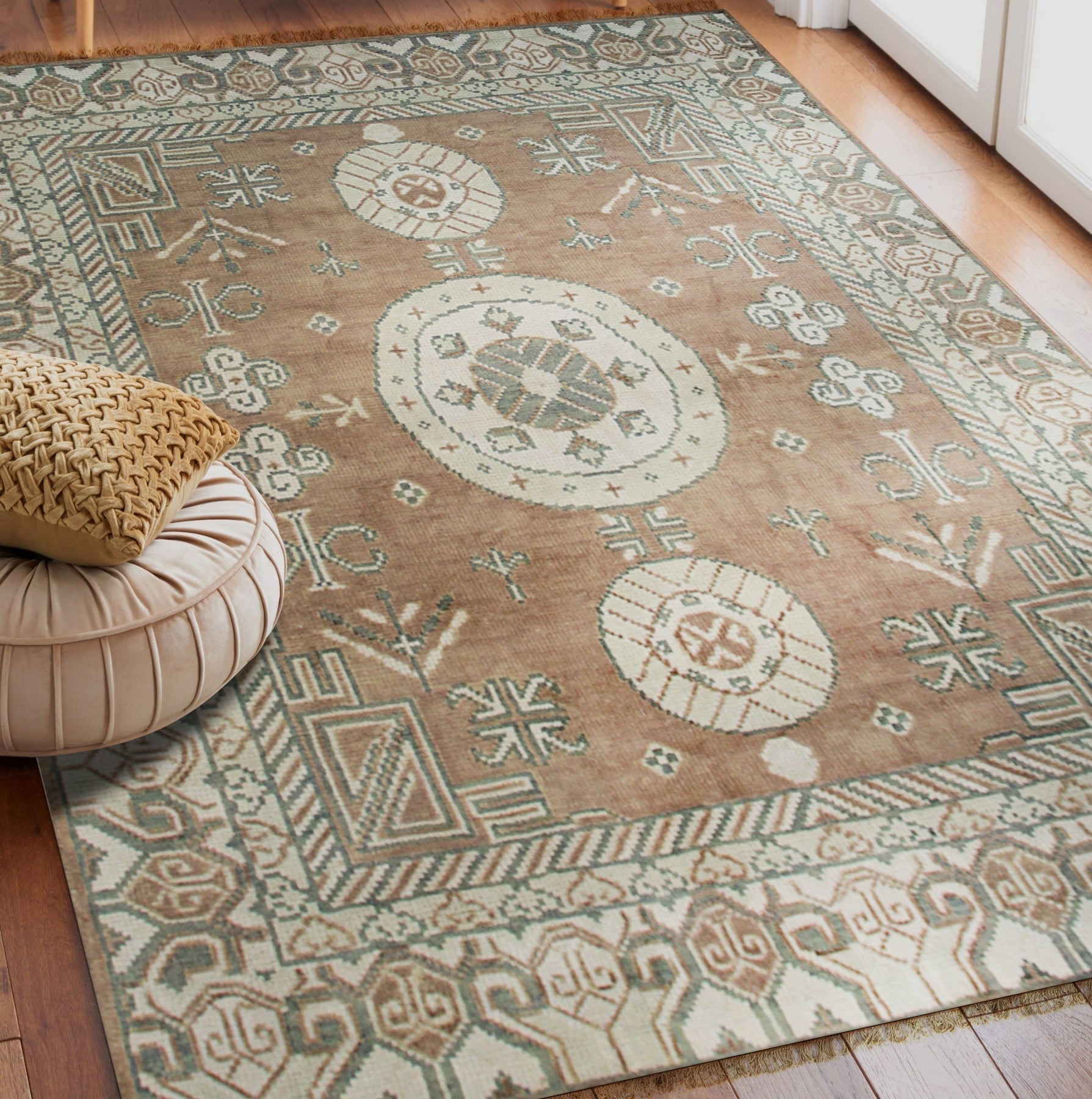 Trendy Traditional Brown Hand Knotted Wool Rug, its intricate patterns and warm brown tones softening a modern living room, showcasing exceptional craftsmanship.
