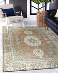 Trendy Traditional Brown Hand Knotted Wool Rug, intricate patterns unfurl across warm brown wool, hand-knotted for enduring quality, nestled in a cozy, inviting room.