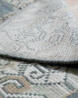 Rhea Traditional Green Hand Knotted Wool Rug, showcasing a detailed, traditional pattern in shades of green and cream, hand-knotted for enduring quality.