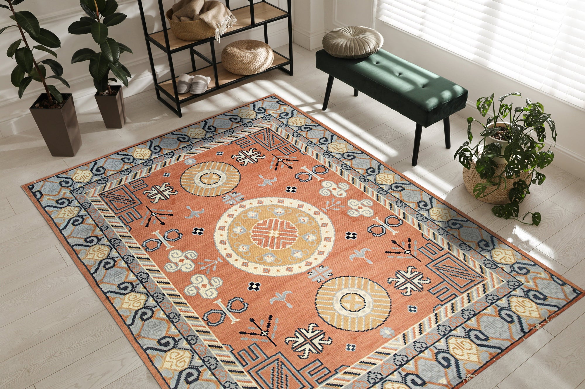 Jade Traditional Rust Hand Knotted Wool Rug, displaying rich rust hues and intricate traditional patterns, complementing a bright living space with neutral furniture.