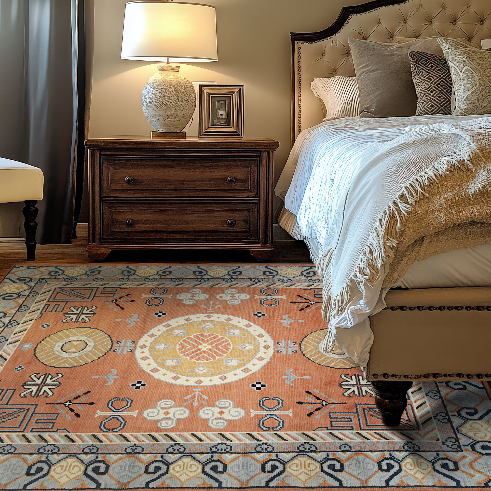 Jade Traditional Rust Hand Knotted Wool Rug, richly patterned in deep rust and jade, rests on a polished wood floor. Warm, inviting tones and intricate traditional design details fill a well-lit interior.
