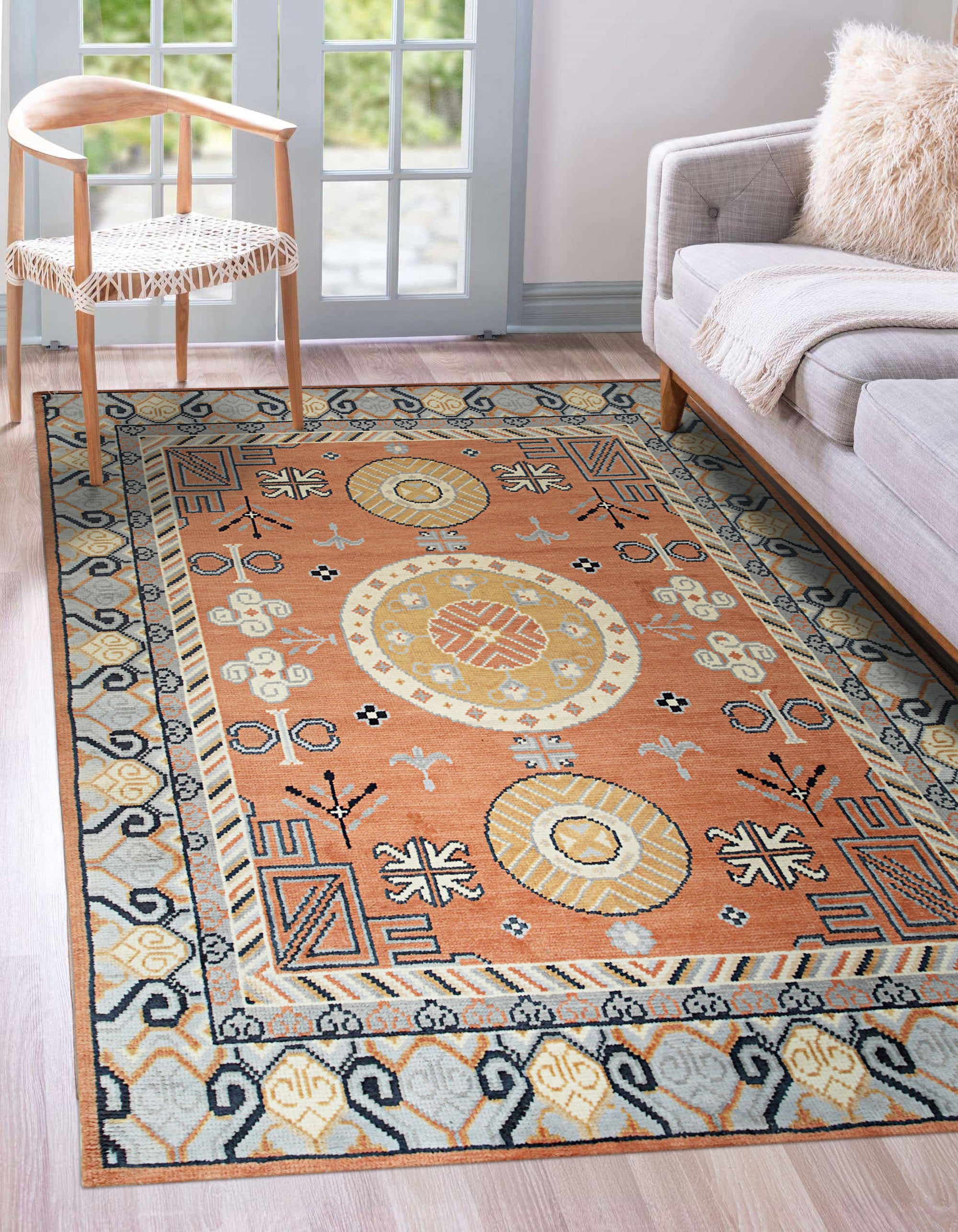 Jade Traditional Rust Hand Knotted Wool Rug, showcasing its intricate traditional patterns in warm rust hues. Hand-knotted wool construction offers a luxurious texture and lasting durability.