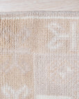 Classic Tessa Brown Hand Knotted Wool Rug, featuring intricate geometric patterns in warm brown tones, subtly textured and laid flat to showcase its detailed design.