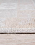 Classic Tessa Brown Hand Knotted Wool Rug, warm browns and creams weave a timeless pattern in this hand-knotted wool rug, nestled within a bright, modern living space.