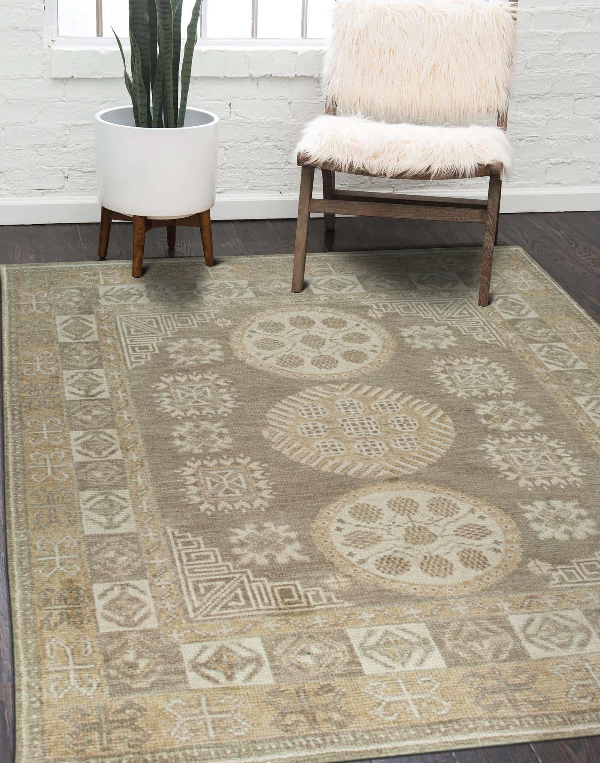 Classic Tessa Brown Hand Knotted Wool Rug, warm earthy tones softly blend across this hand-knotted wool rug, lending a touch of rustic elegance to the space.