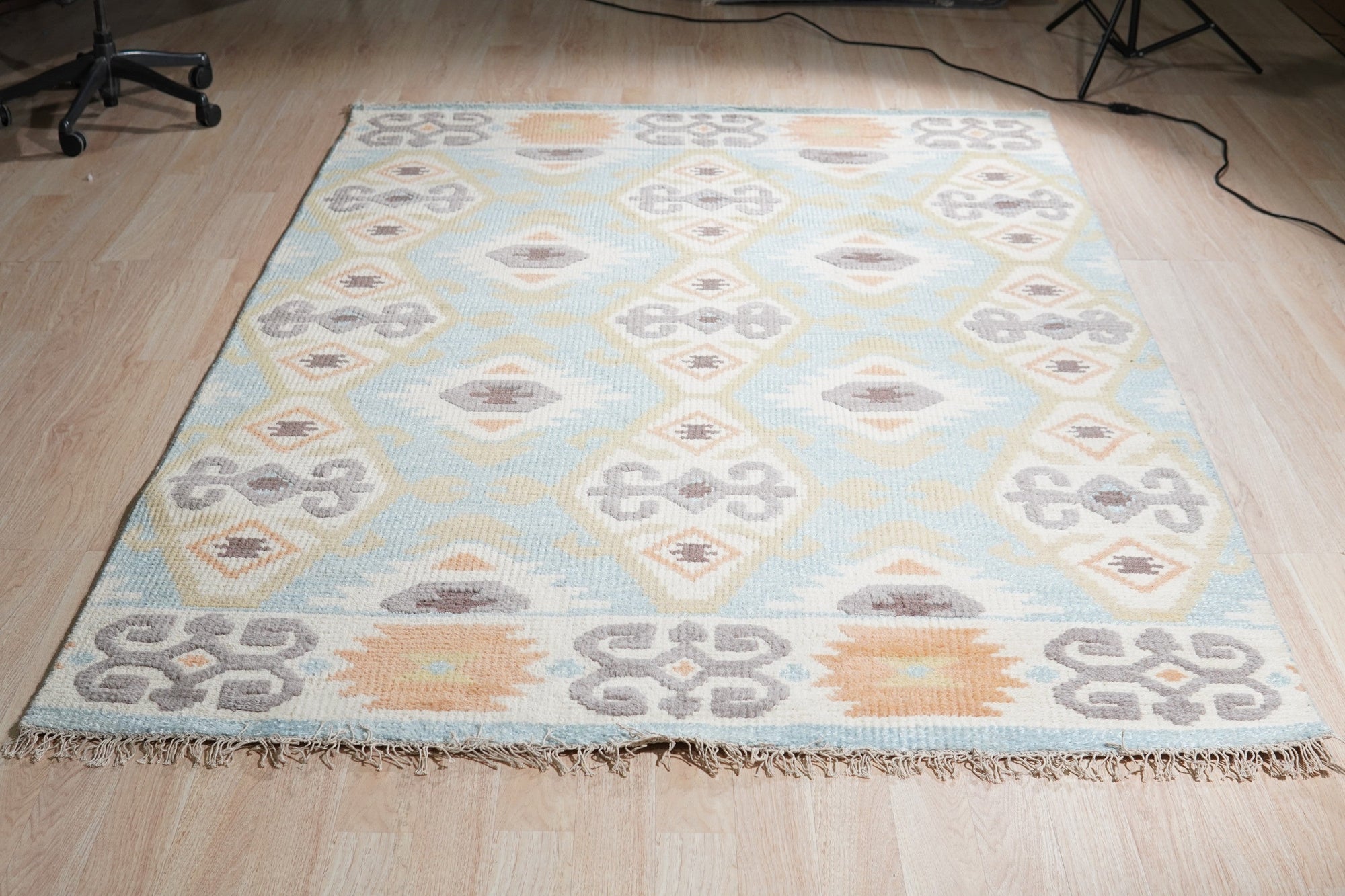 Freya Traditional Blue Hand Knotted Wool Rug, a detailed view showcasing the intricate patterns and deep blues of this hand-knotted wool rug, highlighting the traditional craftsmanship.