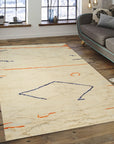 Delicate Moroccan Beige Hand Knotted Wool Rug, a beige wool rug with a subtle Moroccan design, filling a sunlit living room with warmth and texture.