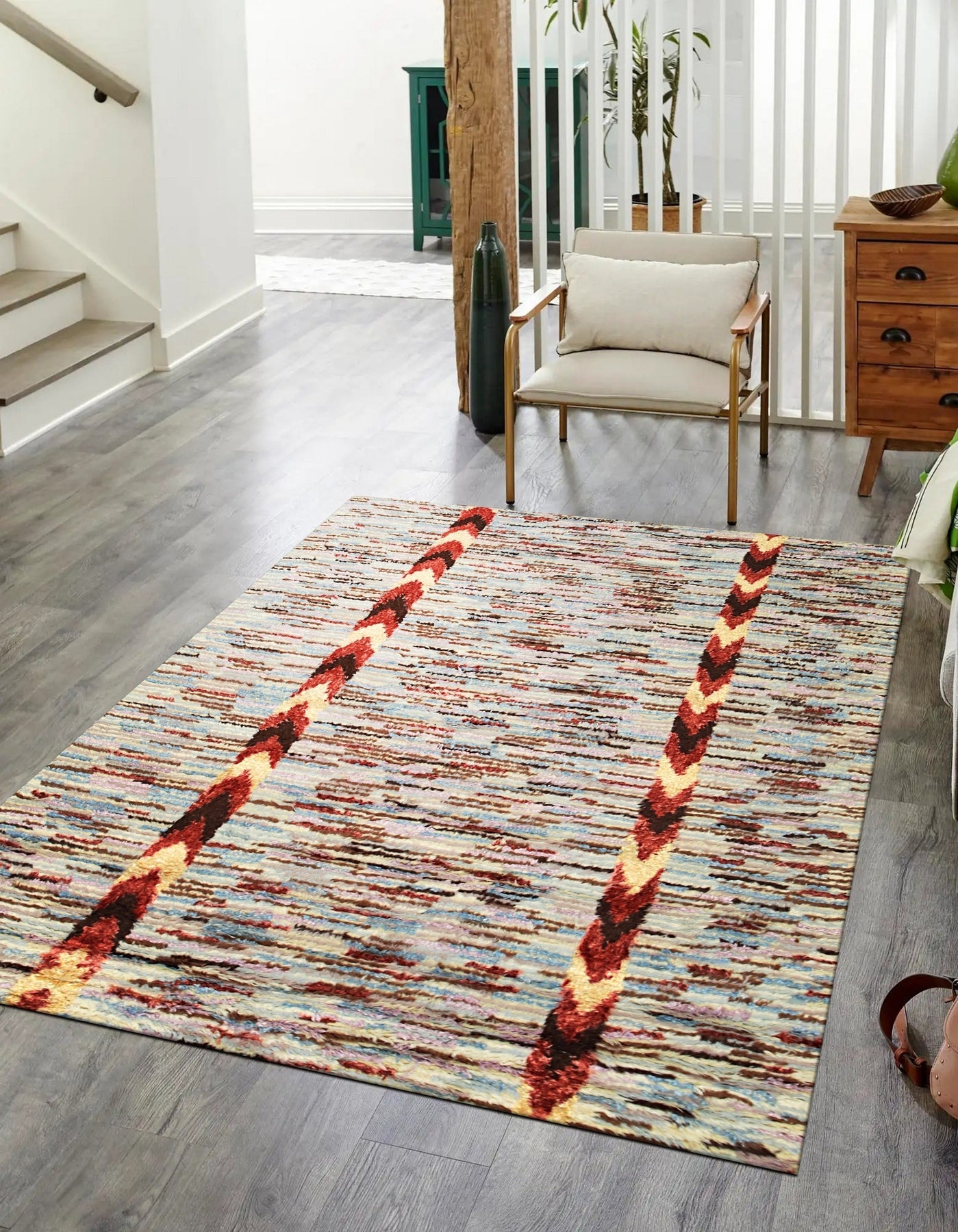 Sumptuous Willow Multicolor Hand Knotted Wool & Bamboo Silk Rug, displaying vibrant hues and intricate design details, rests invitingly on a hardwood floor, offering a touch of elegance and warmth to the space.