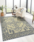 Louie Para Blue Hand Knotted Wool & Bamboo Silk Rug, blending cool blues and shimmering silk highlights, showcased in a modern living room setting with neutral furniture.