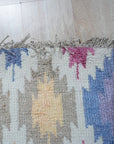 Sumptuous Majestic Multicolor Hand Knotted Wool & Bamboo Silk Rug, vibrant swirls of blues, greens, reds, and golds blending seamlessly in a hand-knotted wool and bamboo silk construction, creating a luxurious and dynamic floor covering.