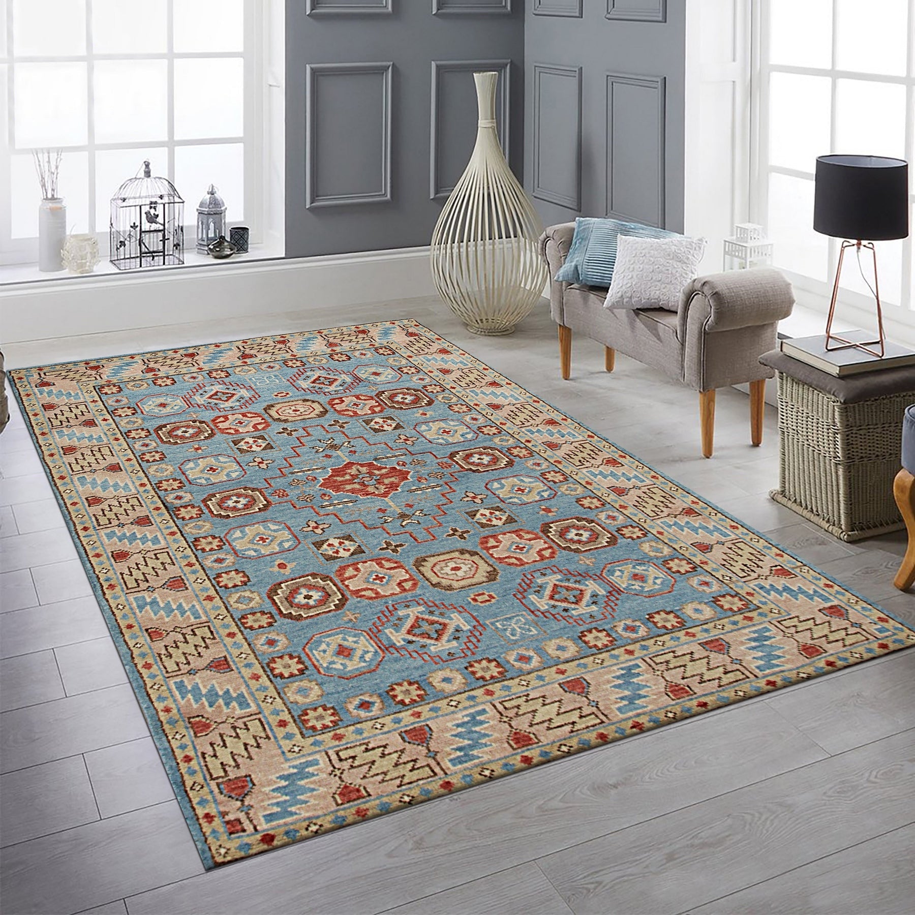 Charming Refined Blue Hand Knotted Wool Rug, features a classic geometric design in shades of blue and ivory, resting on a dark hardwood floor. Warm, inviting light highlights the rug's texture and intricate knotting.