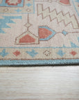 Given the image position is 4, here's the alt text:
 
 Yara Willow Light Blue Hand Knotted Wool Rug in a living room setting, subtly textured light blue tones grounding the space.