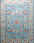 Isolated view showcases the Yara Willow Light Blue Hand Knotted Wool Rug, revealing its intricate design patterns.
