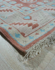 Penelope Traditional Rust Hand Knotted Wool Rug, vibrant rust and earthy tones intertwine in this hand-knotted wool rug, showcasing intricate traditional patterns and texture.