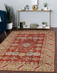 Penelope Traditional Rust Hand Knotted Wool Rug, its intricate patterns and warm rust tones adding a touch of classic elegance to the room.