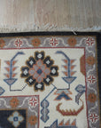 Refined Oushak Charcoal Hand Knotted Wool Rug, charcoal wool rug with a traditional Oushak design, seen in a bright, neutral living room setting.