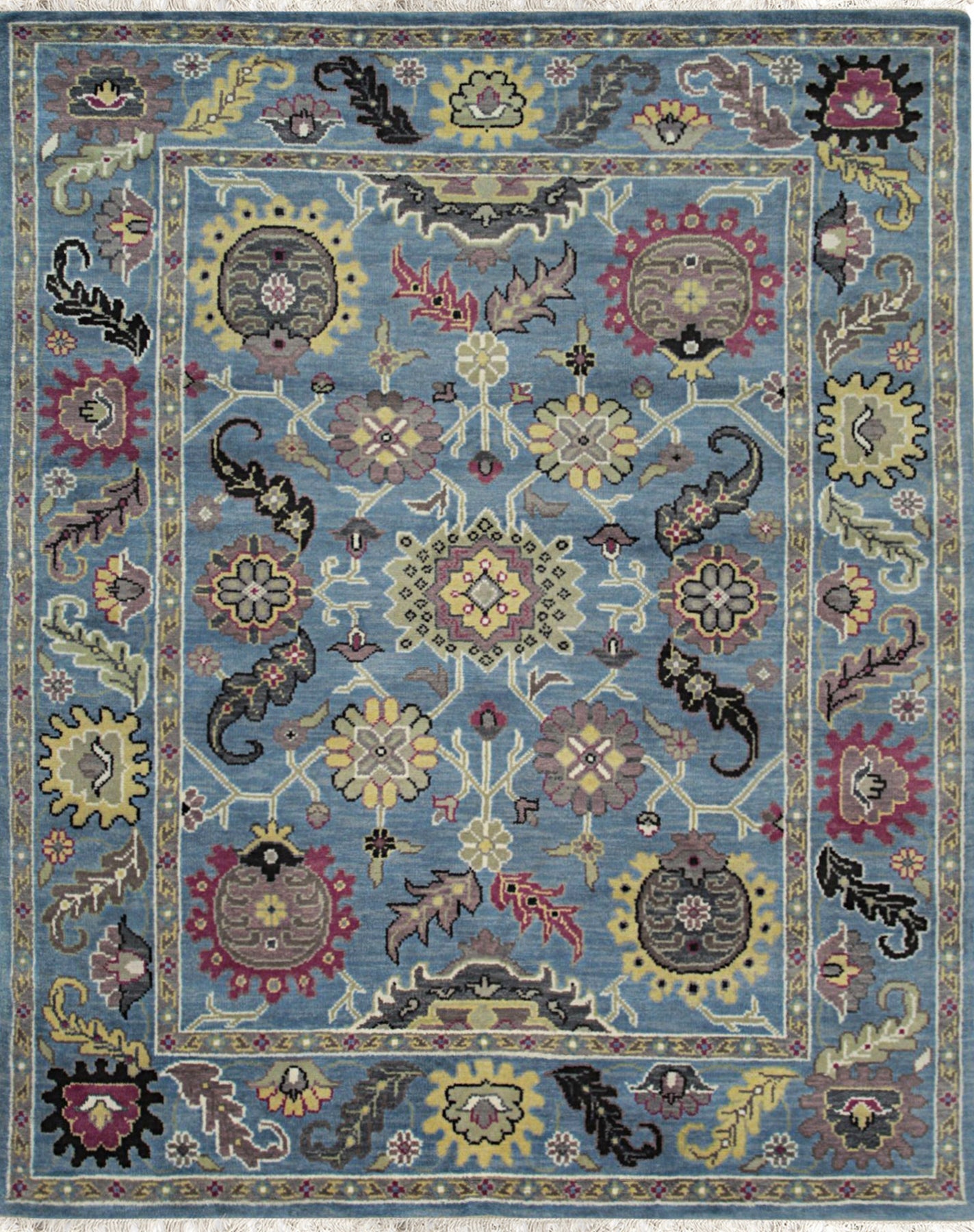 Isolated view of Tessa Laine Blue Hand Knotted Wool Rug, showcasing its intricate geometric design and soft, muted blue hues.