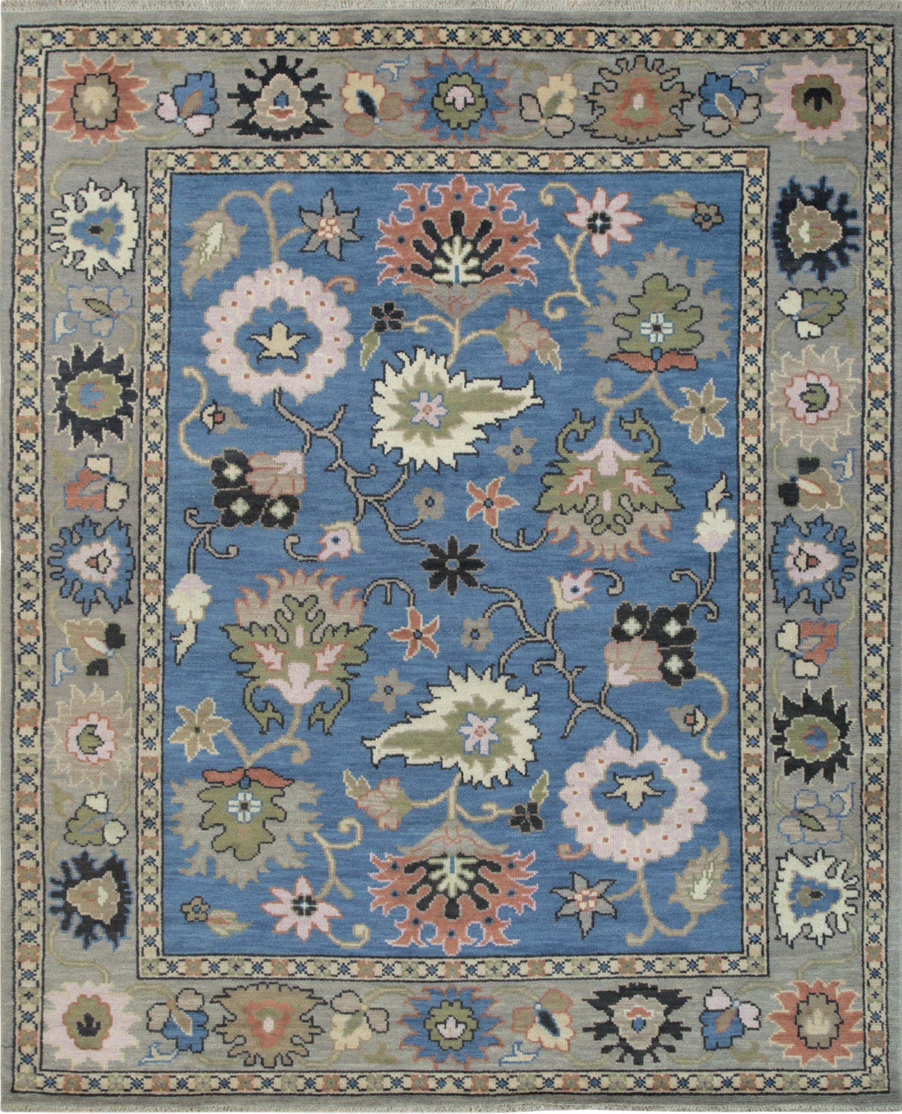 Isolated view of Nina Penelope Blue Nan Rug, displaying its intricate geometric pattern in shades of blue and beige.