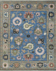 Isolated view of Nina Penelope Blue Nan Rug, displaying its intricate geometric pattern in shades of blue and beige.