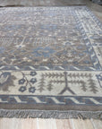 Lydia Sophisticated Brown Hand Knotted Wool Rug, warm browns and subtle patterns create a sophisticated, hand-knotted texture underfoot, adding elegance to a living space.