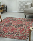 Majestic Classic Rust Hand Knotted Wool Rug, featuring intricate floral and geometric patterns in warm rust tones, displayed in a well-lit room setting.