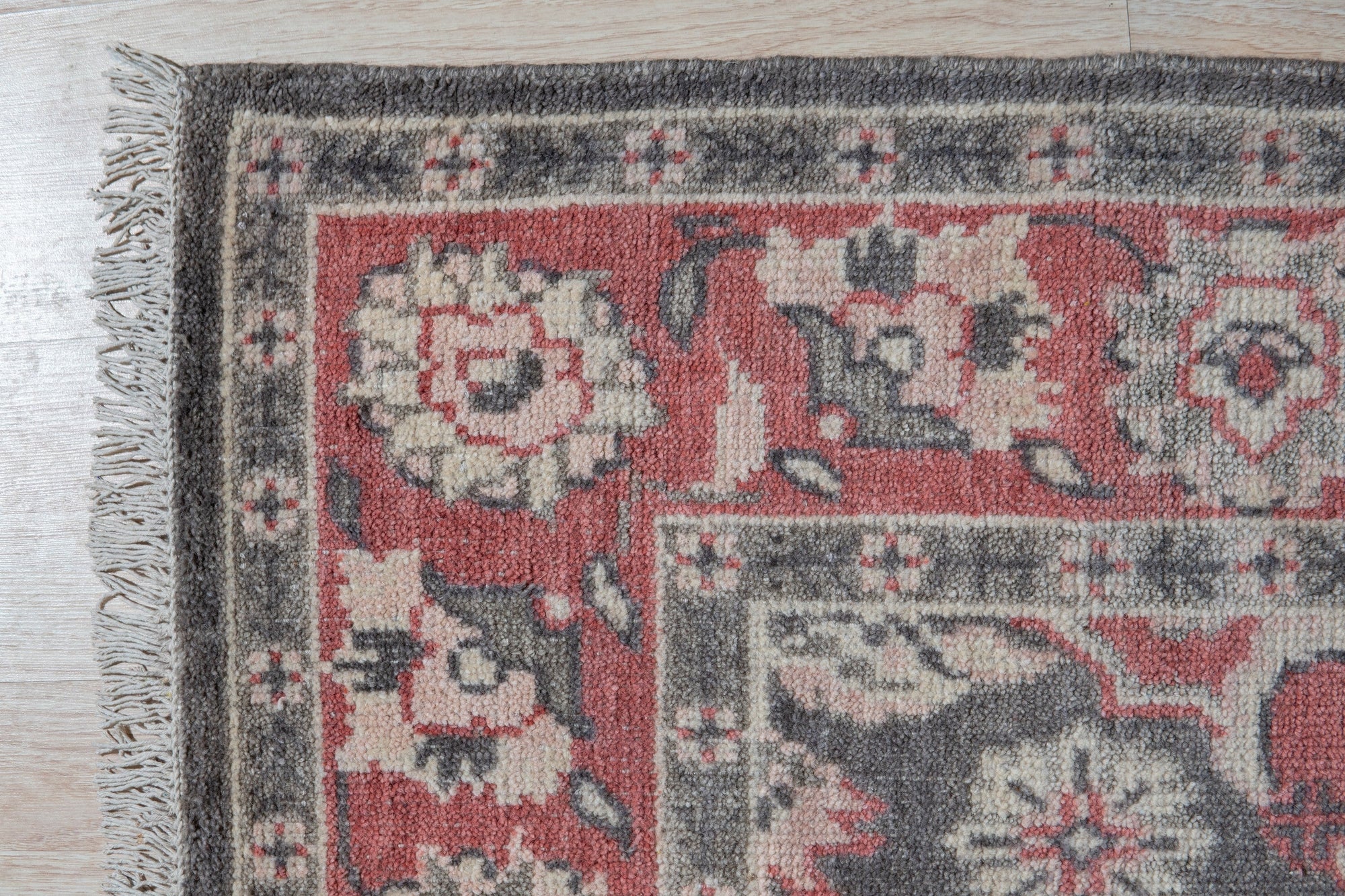 Majestic Classic Rust Hand Knotted Wool Rug, warm rust tones and intricate traditional patterns cascade across this wool rug, grounding a softly lit living space.