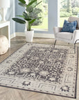 Cozy Oushak Charcoal Hand Knotted Wool Rug, a charcoal wool rug with a traditional Oushak design, displayed in a well-lit room with natural light.