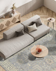 Selene Oushak Rust Hand Knotted Wool Rug displayed in a living room setting, its warm rust tones complementing neutral furniture and creating a cozy, inviting atmosphere. Hand-knotted wool construction evident in the rug's texture and intricate design.