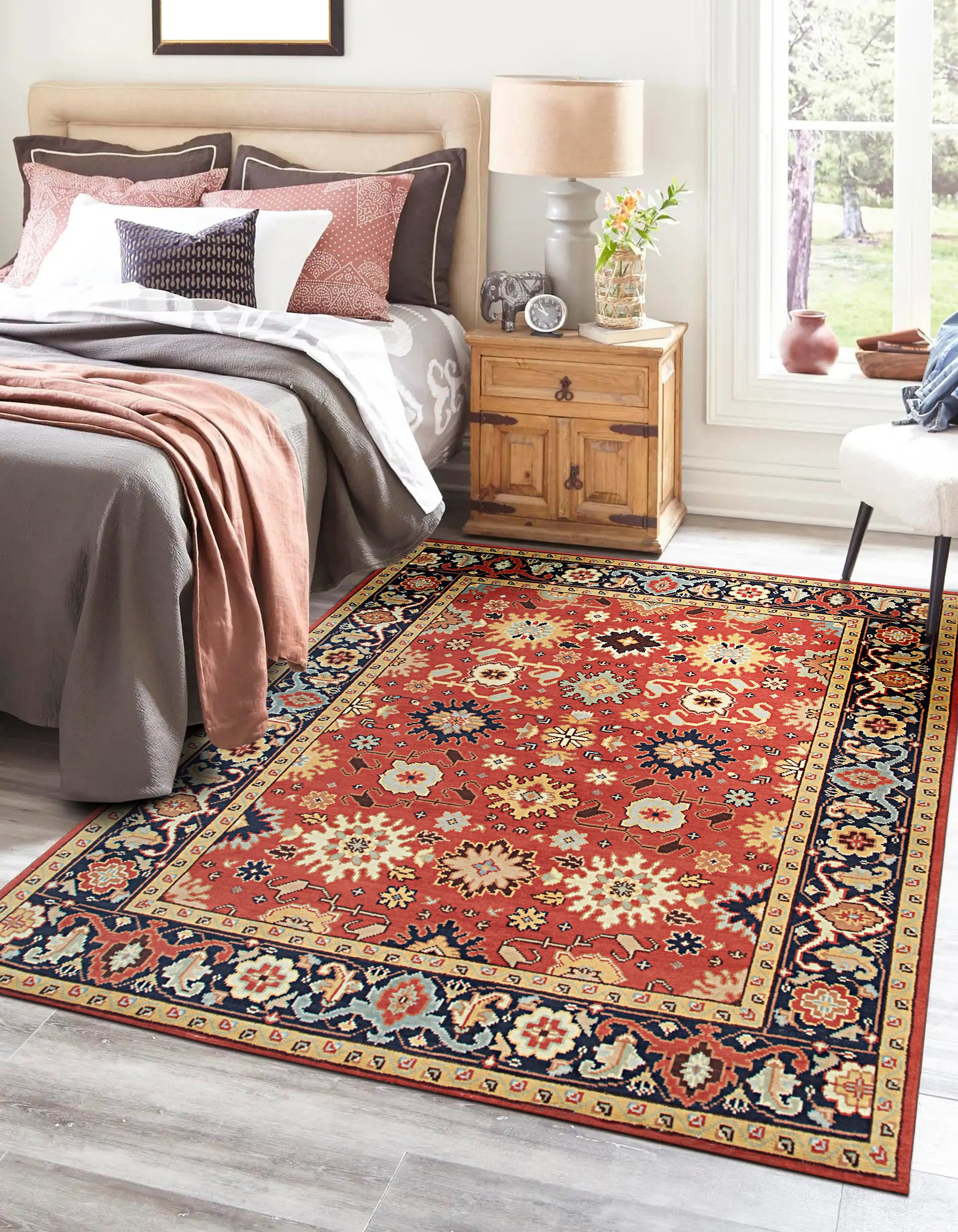 Majestic Versatile Red Hand Knotted Wool Rug, featuring intricate patterns and rich red hues, partially displayed, showcasing texture and craftsmanship.