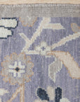 Timeless Oriental Ivory Hand Knotted Wool Rug displayed: muted ivory tones and intricate patterns visible in a detail shot highlighting the hand-knotted construction.
